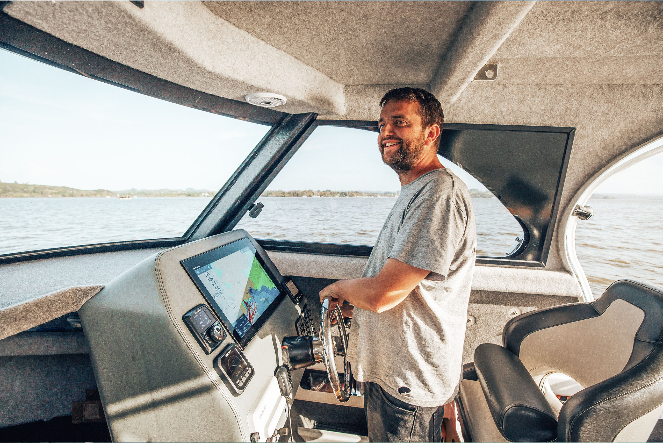 Allan Shaw on the helm of a Makaira Boats 750